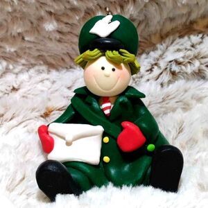 Mailman Christmas ornament. Made to look like playdough. Nice heavy ornament.